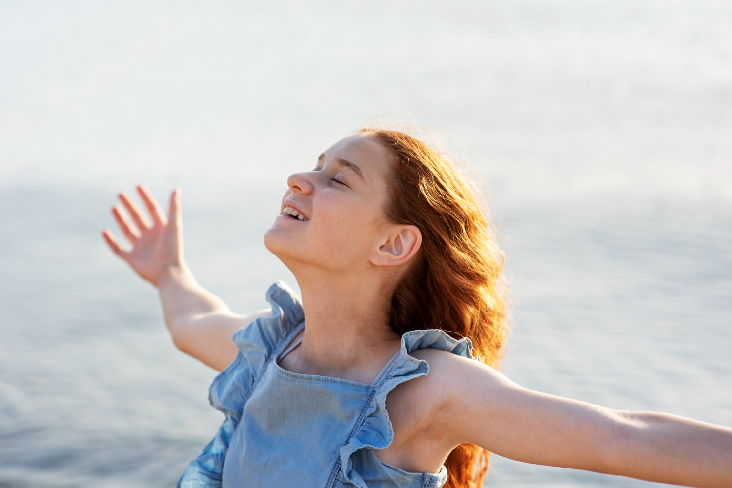 smiley-girl-seaside-side-view